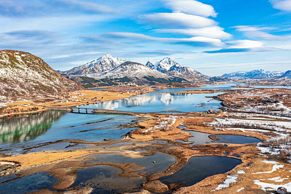Aerial view of mountains reflected in the sea, Leknes, Nordland county, Lofoten Islands, Norway