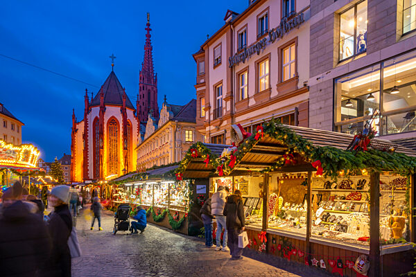 View of Christmas market and Maria Chappel in Oberer Markt at dusk, WÃ_rzburg, Bavaria, Germany, Europe