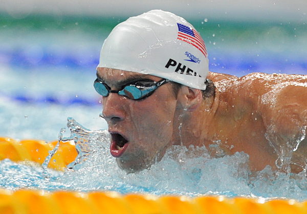 Michael Phelps of USA competes in men's 200m Butterfly heat Swimming event...
