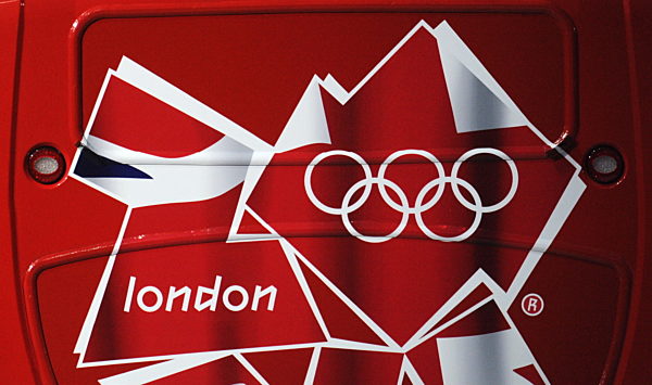 A typical British double decker bus with the London 2012 logo symbolizes the...