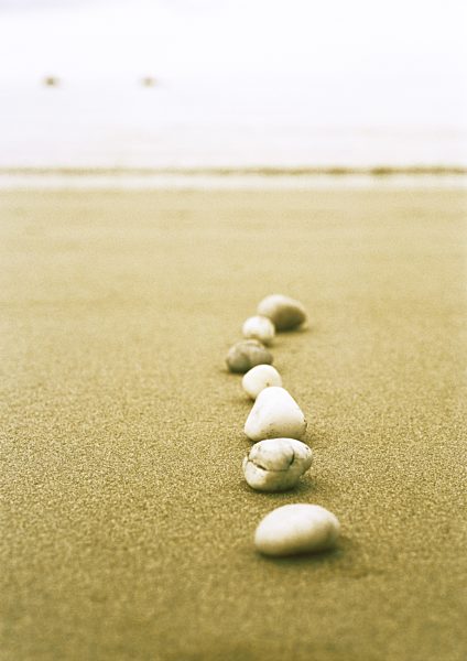 Line of pebbles on beach