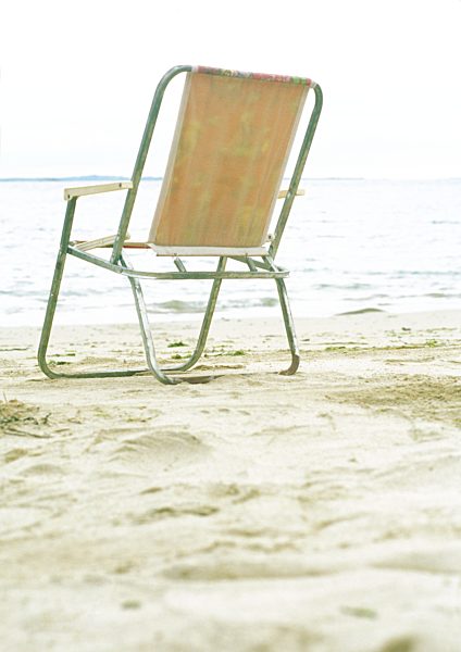 Folding chair on beach
