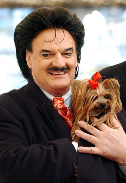 Fashion icon Moshammer with dog Daisy at "Holiday on Ice"