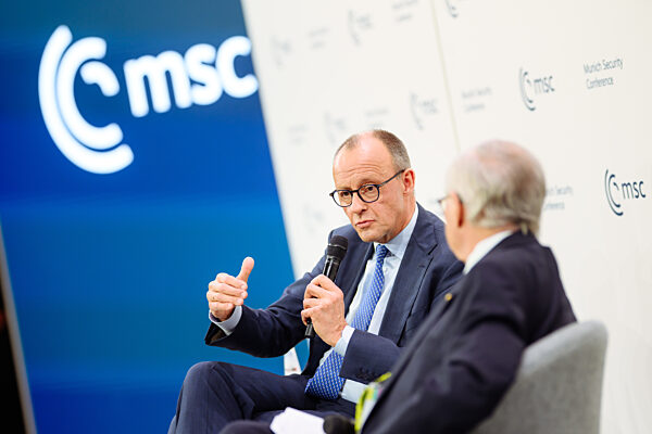 Friedrich Merz Engages in Discussion at Munich Security Conference