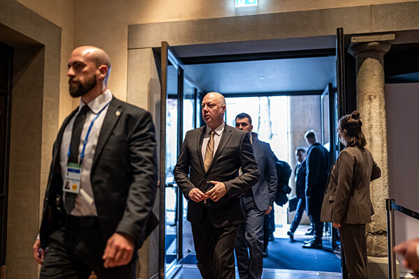 Delegates Arriving at a High-Level Security Conference