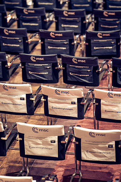 Empty Chairs Awaiting Delegates at the Munich Security Conference