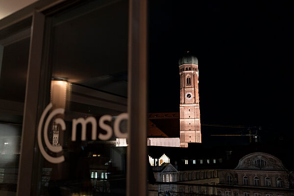 Nighttime View of Munich's Iconic Frauenkirche from the Munich Security Conference