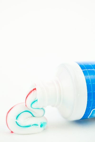 Multicolour toothpaste outgoing of a tube of toothpaste