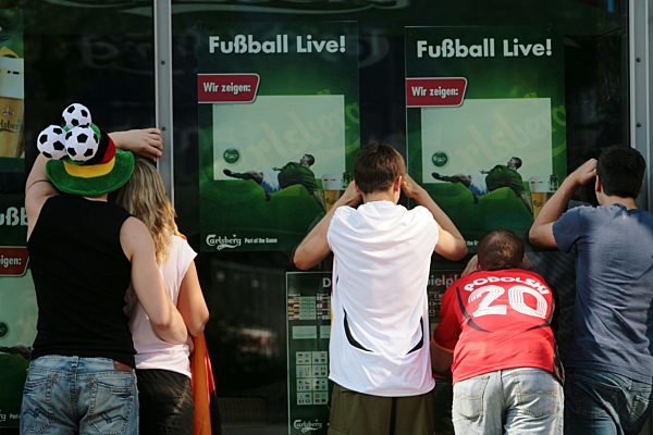 Supporters of Germany try to watch the FIFA World Cup final round match...