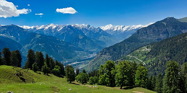 Panorama of meadow in Kullu valley in Himalaya mountains in spring, Himachal Pradesh, India